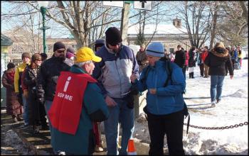 People wait in line for a chance to use their ticket to the U.S. National Toboggan Championships. (Photos and video by Chris Wolf)