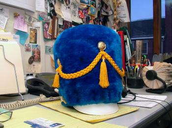 A vintage Belfast Area High School marching band hat in the downtown office of Mike Hurley. The longtime city booster is hoping to spark local interest in an activist marching band, like those featured at the annual Honk! festival. (Photo by Ethan Andrews)