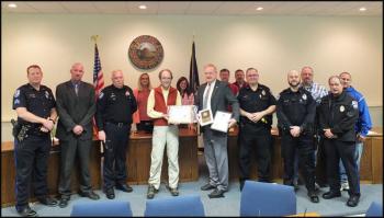 Front row, from left, Rockland Police Sgt. Ken Smith, Detective Sgt. Chris Young and Chief Bruce Broucher, Mayor Larry Pritchett, Officer Lloyd Daniels (ret), Sgt. Anthony Camporiale, Officer Jacob Shirey and Sgt. Don Finnegan; back row, from left, City Councilors Louise MacLellan-Ruf, Elizabeth Dickerson, Eric Hebert and Frank Isganitis, Deputy Police Chief Wally Tower and Officer Scott Solozarno. (Photo by Chris Wolf)