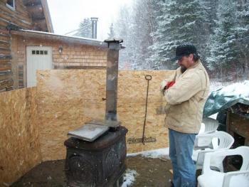 Scott Ardnt, of Emma’s Maine, making maple syrup the old-fashioned way. (Photo courtesy Emma’s Maine)