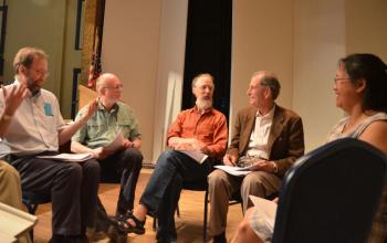 The Rockport Select Board convenes after annual town meeting on the stage to elect its chairman and vice chairman. Ken McKinley, Bill Chapman, Geoffrey Parker, Charlton Ames and Tracy Murphy. (Photo by Lynda Clancy)