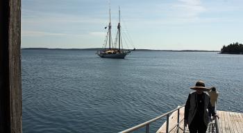 Guests arrive on the dock at Marshall Island, home of Maine Coast Heritage Trust’s Ed Woodsum Preserve. (Photo by Holly S. Edwards)