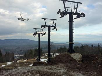 Towers for Camden Snow Bowl’s new triple chairlift begin to dot the top of Ragged Mountain Dec. 1. (Photo by Beth Ward)