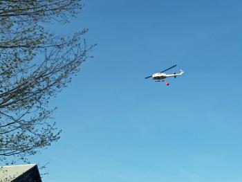 A Maine Forest Service helicopter in Searsmont early Thursday evening. (Courtesy Bob Hall)