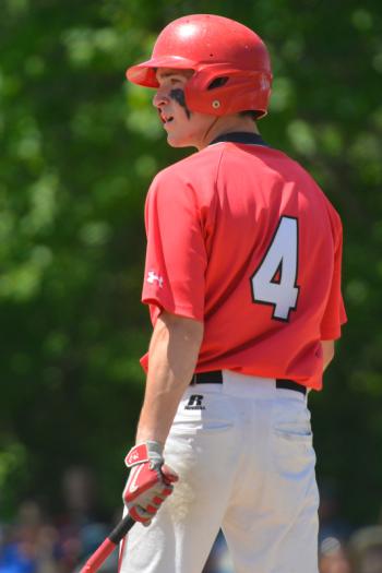 Camden Hills’ Matt Crockett looks down to third base to get the signals from Coach Hart (not shown). (Photo by Ron Hawkes)