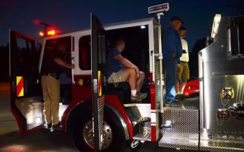 Rockport’s newest addition to its fleet of fire apparatus arrived just as dark fell, when Fire Chief Jason Peasley arrived with Engine 23. The new truck will be stationed in West Rockport. (Photo by Lynda Clancy)