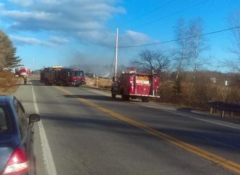 Emergency responders at the scene of a multi-vehicle accident, caused by an out-of-control Freightliner tractor-trailer carrying a load of lumber along Route 17 in Washington late Friday afternoon. (Courtesy James Payson)