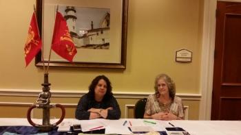 Stacey Parra and Linda Greenlaw at the check-in table. (Photo by Sarah Shepherd)