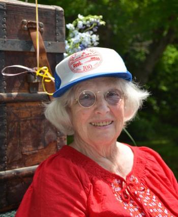 Elizabeth Berry, longtime Rockport resident, wearing her mother’s 100th Rockport anniversary cap. Elizabeth’s mother, Goodie Kononen, was active in the town her entire life. Goodie was the daughter of Hans Heinstad, who designed Beech Nut, which sits atop Beech Hill. (Photo by Lynda Clancy)