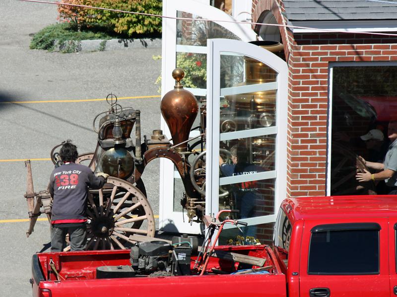 Camden's 1892 horse-drawn steam fire pumper heads outside on the anniversary of 9/11.