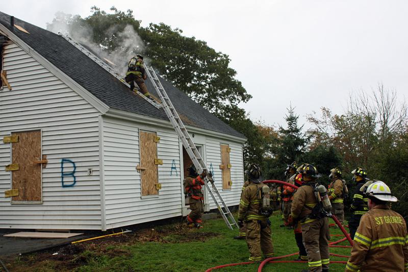 More safe ladder work. (Photo by Holly S. Edwards)
