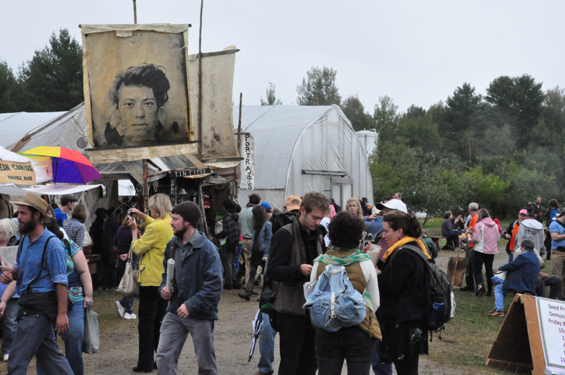 AgNO₃ Labs tin type photo banner looks over fairgoers.