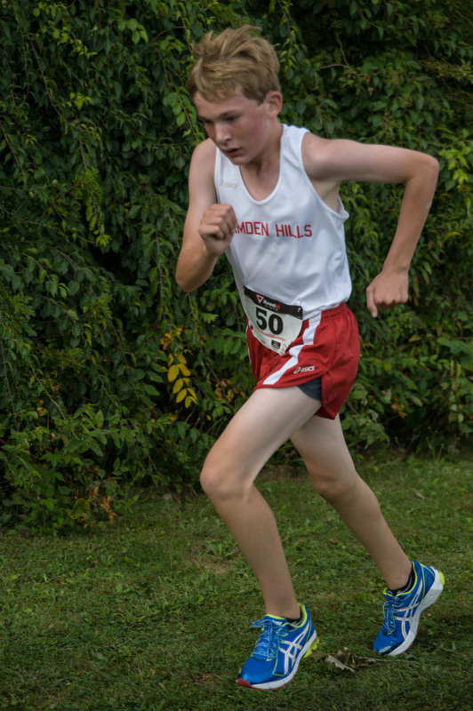 Camden Hills Nick Denny gives it all he has. Photo by Ron Hawkes