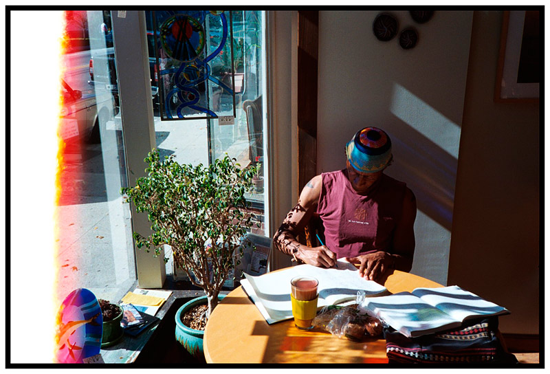 CAMDEN - Kwah Waadabisha works on an essay about the Rainer Maria Rilke poem "Archaic Torso of Apollo" in a downtown coffee shop.