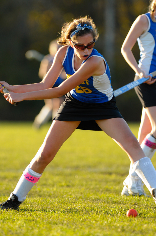 Troy Howard's Anna Baiungo gets all of this ball as she swings with everything she has. (Photo by Ron Hawkes)