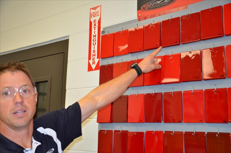 For Camden and Lincolnville, the official color is No. 90, Candy Apple Red. Brad White points that out. (Photo by Lynda Clancy)
