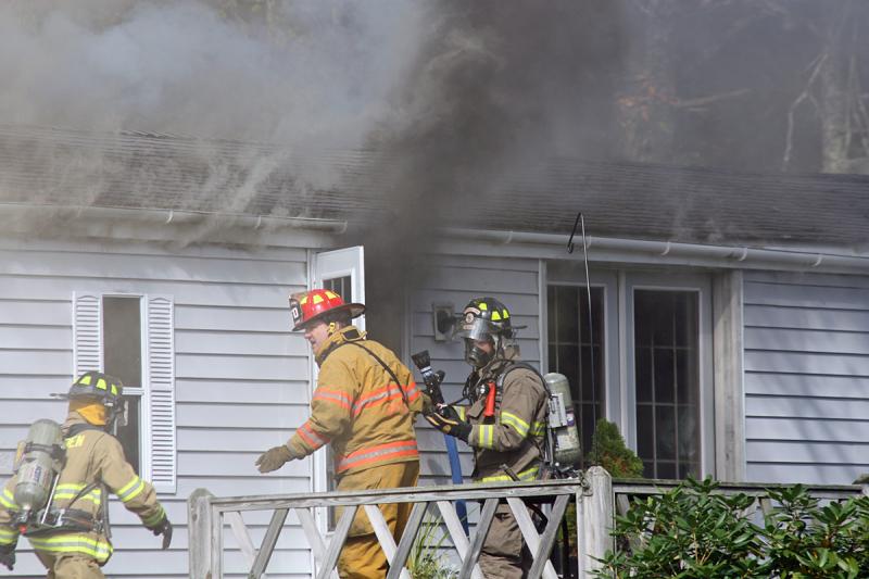 Camden, Hope, Lincolnville and Rockpot firefighters respond to a fire at 181 Mechanic St. (Photo by Holly S. Edwards)