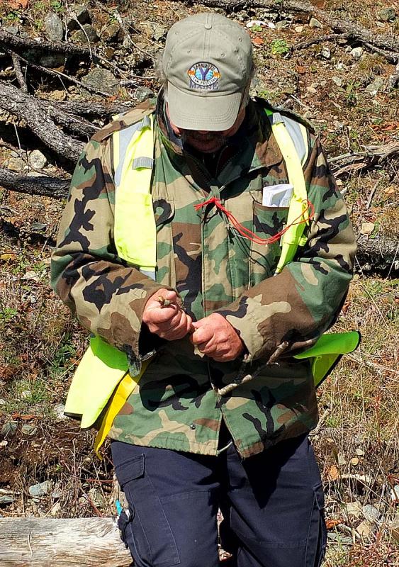 When disaster strikes and emergency supplies are limited, nature often provides alternatives. In this case, a stick will aid in creating a turniquet. (Photo by Holly S. Edwards)