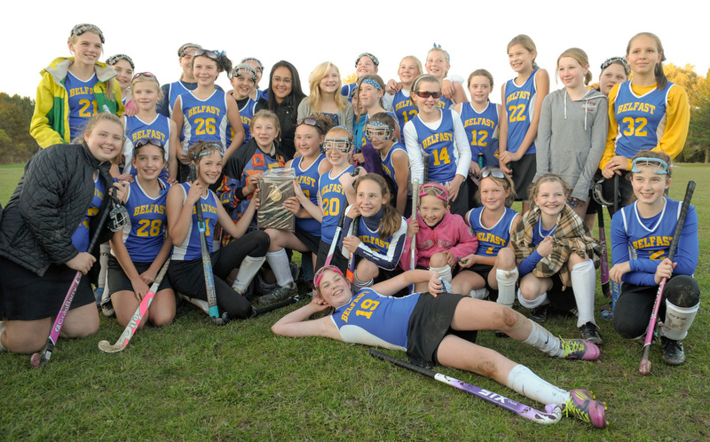 A care free and happy Troy Howard field hockey team is all smiles after winning the championship. (Photo by Ron Hawkes)