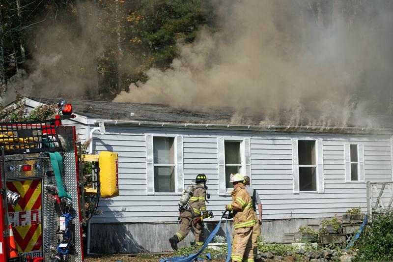 A fire at a mobile home on Mechanic Street in Camden claimed the life of a cat and caused extensive smoke and heat damage inside. (Photo by Holly S. Edwards)