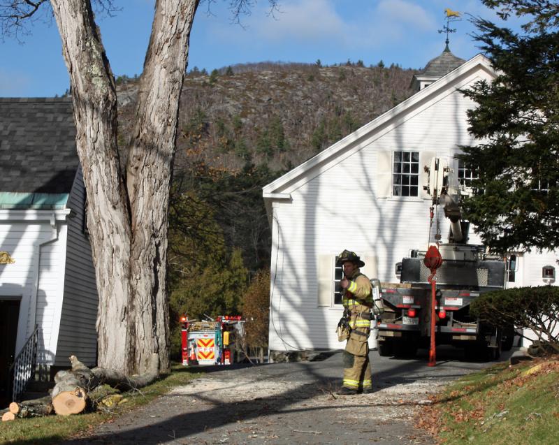 The residence at 26 High St. in Camden sits back off the road, behind a pair of homes. (Photo by Holly S. Edwards)