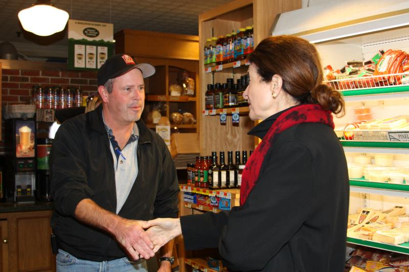 Sen. Olympia Snow greets French & Brawn owner Todd Anderson Nov. 1. (Photo by Holly S. Edwards)