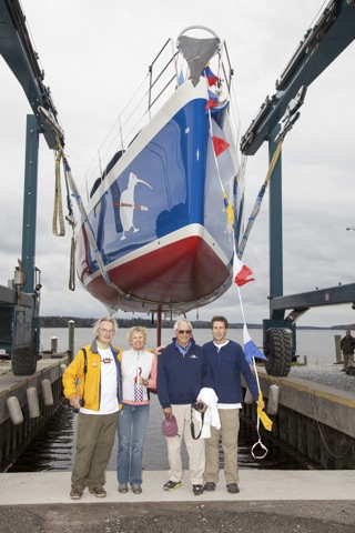 Stanley Paris, Heidi Lyman, Cabot Lyman and Drew Lyman prepare for the launch.