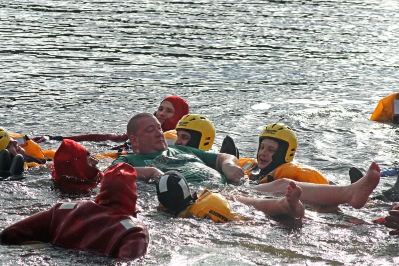 Justin Hills proves time and again that a little cold water doesn't bother him, especially when it's a chance to train for water rescues. (Photo by Holly S. Edwards)