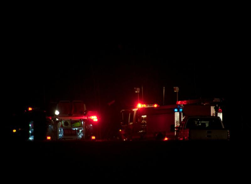 Firefighters from Rockland, Owls Head and South Thomaston extinguished the burning Cessna that crashed at Knox County Regional Airport Friday night. (Photo courtesy Steve Waterman)