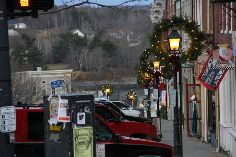 Christmas wreaths line Main Street in downtown Belfast. (Photo by Wes Sterrs)