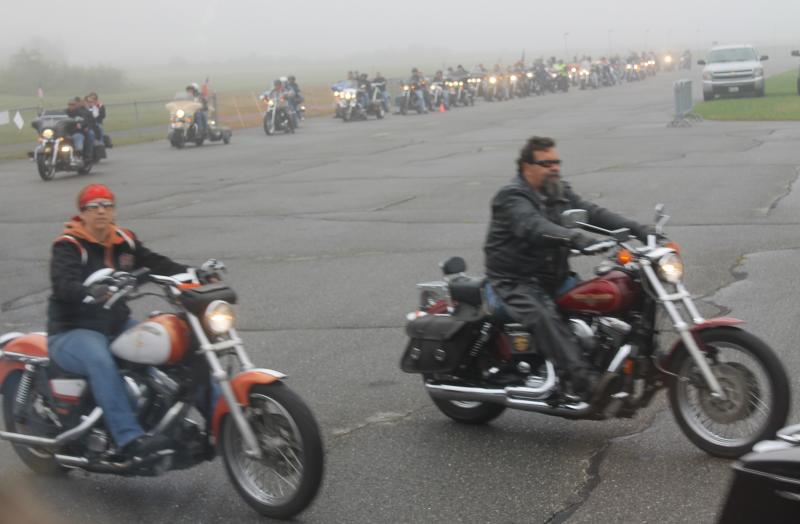 Fog did not dampen the spirits of those participating in the 2012 Special Olympics Torch Ride. (Photo courtesy Larry Hesseltine)