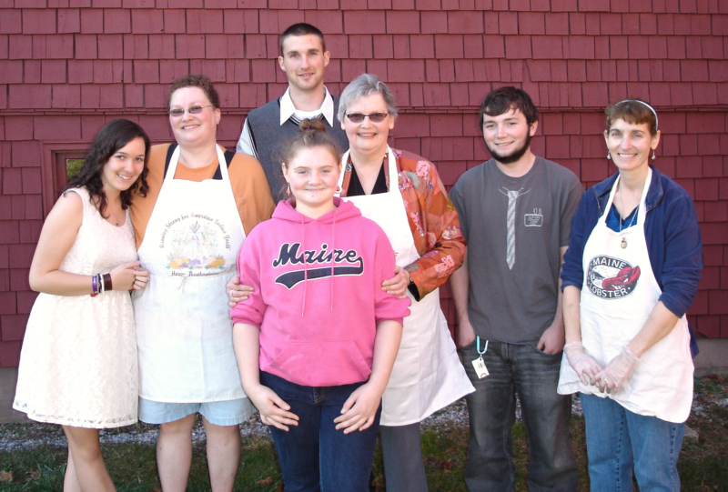 Three generations of volunteers: Eve Hupper, Collen Elder, Cassi Bennet, Elijah Hupper, Lucia Elder, Chris Lowden and Wanda Benner. (Photo by Chris Wolf)