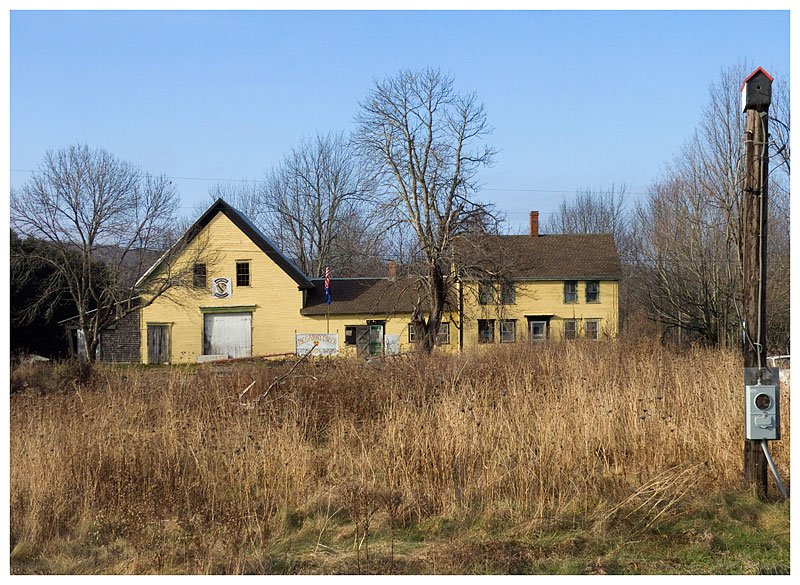 The old Montville farmhouse donated to the Garry Owen Motorcycle Club, currently under renovation as a veteran's shelter, seen from Route 3. (Photo by Ethan Andrews)