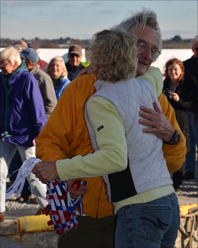 Stanly Paris thanks Heidi Lyman for christening his new cruising yacht.