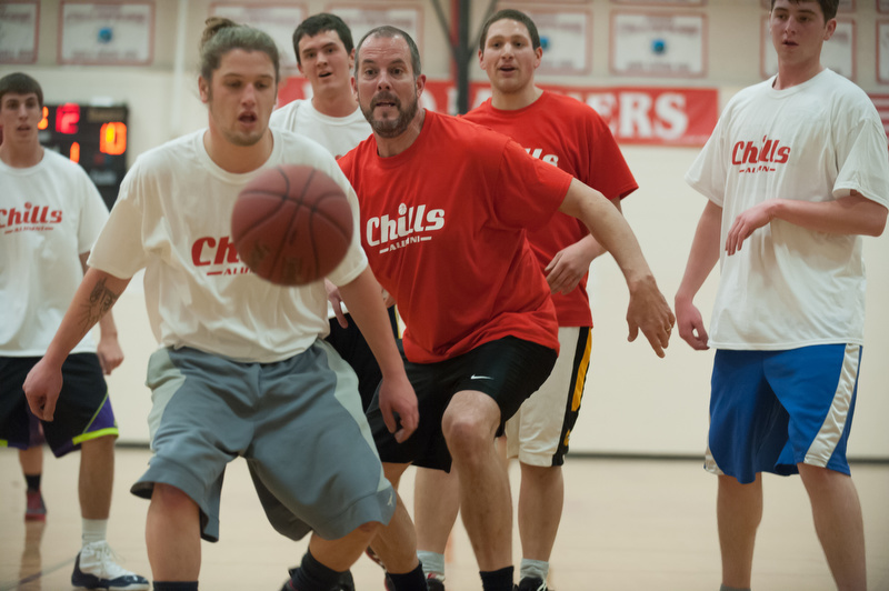 Zack Wincklhofer and Jeff Hall go after a loose ball as Cameron Gartley, Daniel Hart, Jarred Mitchell and Casey Scott look on. (Photo by Ron Hawkes)