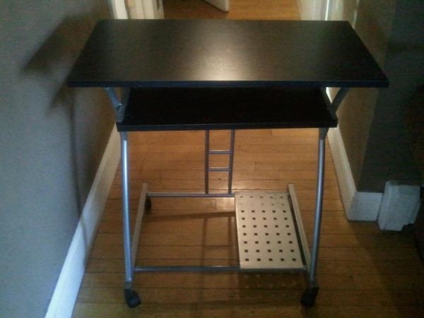 Small Desk missing one wheel (Windham )