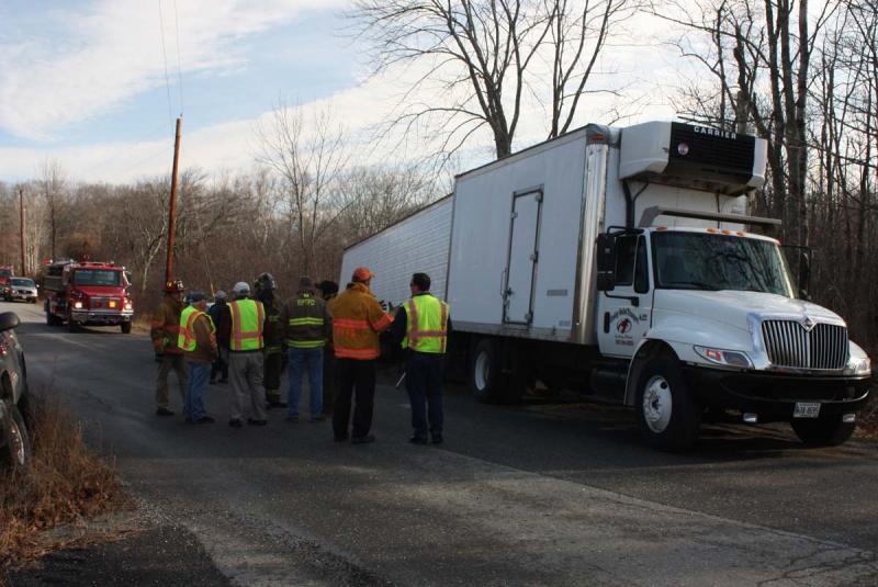 Unfortunately for the lobsters, Sunday's accident did not alter their fate as another big rig was en route to take them to Canada later in the day Sunday. (Photo by Holly S. Edwards)