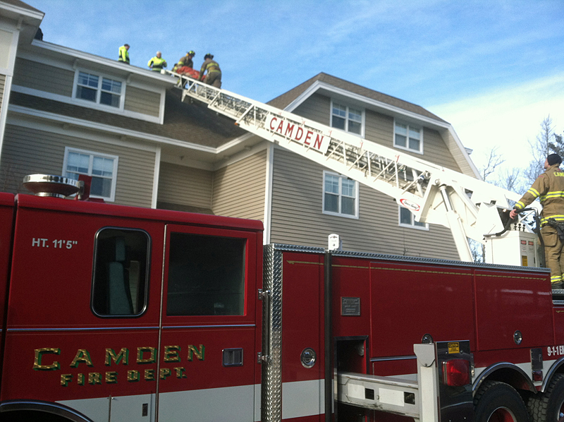 Due to the nature of the worker's knee injury, transport off the Quarry Hill roof with a ladder was deemed easier and safer. (Photo courtesy Justin Hills)