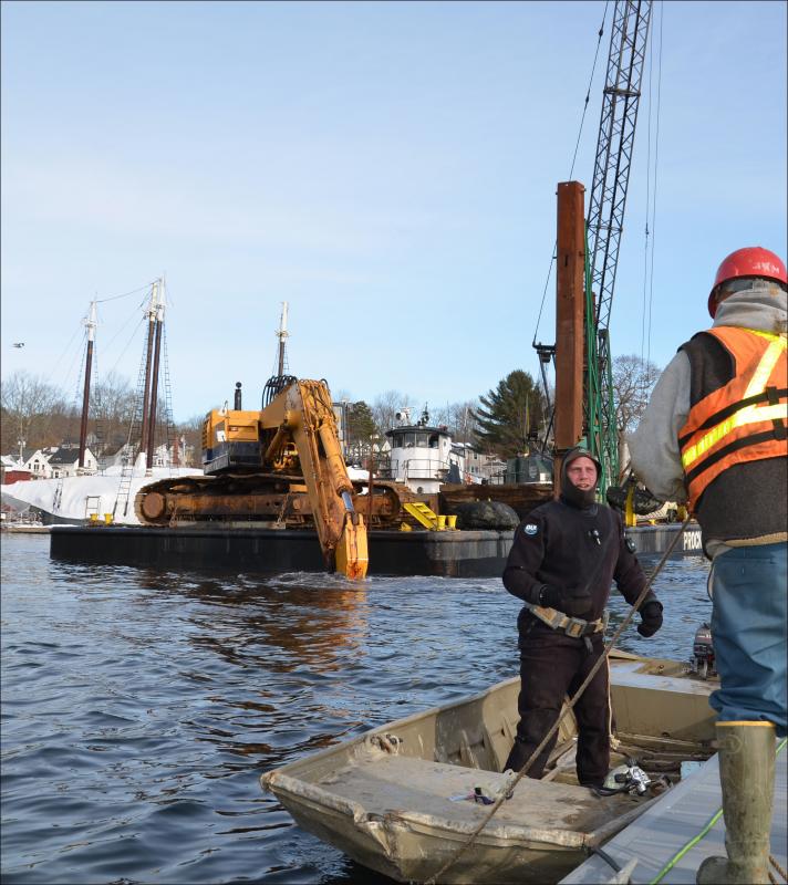 Toby Wincklhofer will dive beneath the tug to detangle line from a propeller with Jamie Dever taking him over to tug. (Photo by Lynda Clancy)