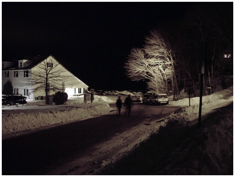A pair of revelers walk the stretch of Front Street leading to the Belfast Boathouse. (Photo by Ethan Andrews)