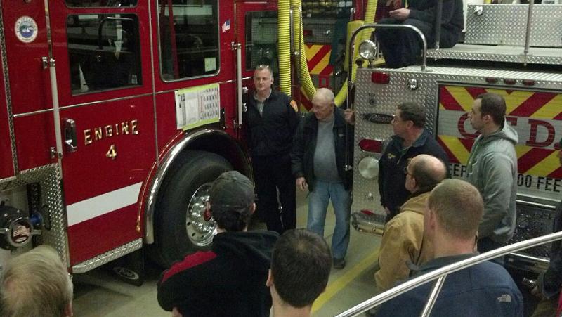 Unbeknownst to Harold Drinkwater, under the paper taped to the side of Engine 4 is his name in gold letters. (Courtesy Ryan Fisher)