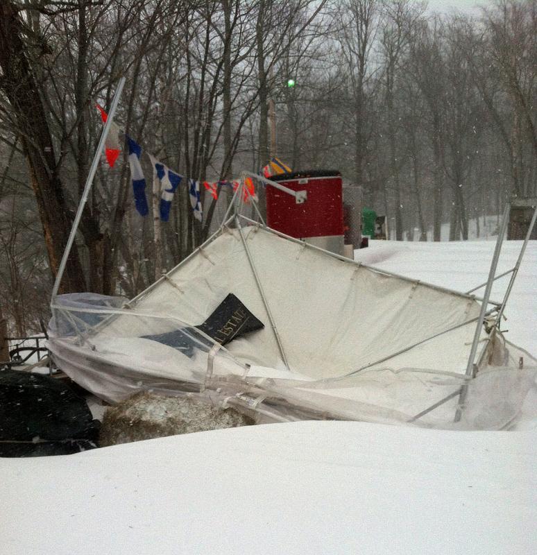 A vender tent broke and flipped overnight Friday in the blizzard. (Photo by Andrew Dailey)