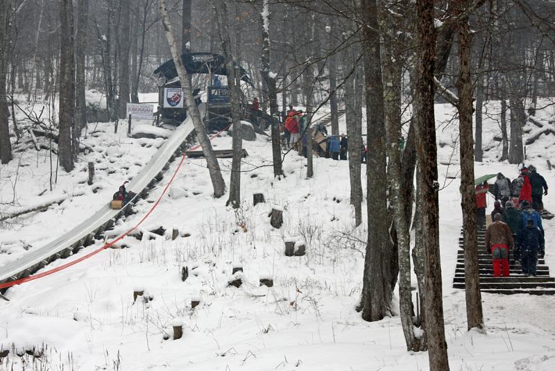 The Camden Snow Bowl toboggan chute was broken in Friday, with people consistenly qeued up to take a slide down. (Photo by Holly S. Edwards)