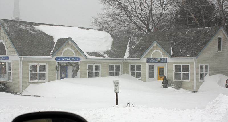 Snow-swamped businesses abound in downtown Camden tonight. (Photo by Holly S. Edwards)