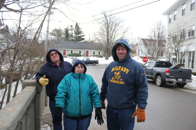 Tracy Harford and his parents were back on the scene at 7 a.m. Saturday morning. (Photo by Lori Van Dusen)