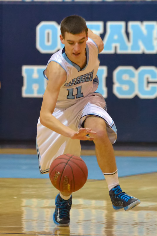 Oceanside's Nick Judge gets a loose ball under control after tipping it away from a Foxcroft player. (Photo by Ron Hawkes)