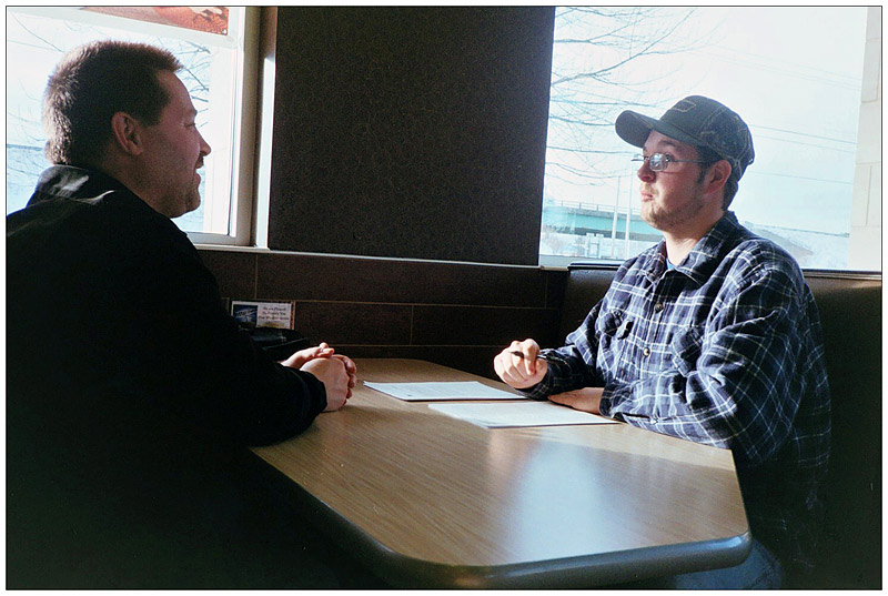 BELFAST - John Jewell of Bangor, left, interviews Trevor Burleigh of Old Town at McDonald's for a commercial trucking job. BELFAST - John Jewell of Bangor, left, interviews Trevor Burleigh of Old Town at McDonald's for an unrelated commercial trucking job. (Photo by Ethan Andrews)