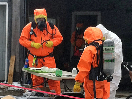 Maine Drug Enforcement agents and others at work Tuesday investigating a suspected methamphetamine laboratory on St. George Road (Route 131) in South Thomaston. A resident, Paul Mahonen, 36, has been arrested and charged with trafficking in drugs. (Courtesy Maine Drug Enforcement Agency)