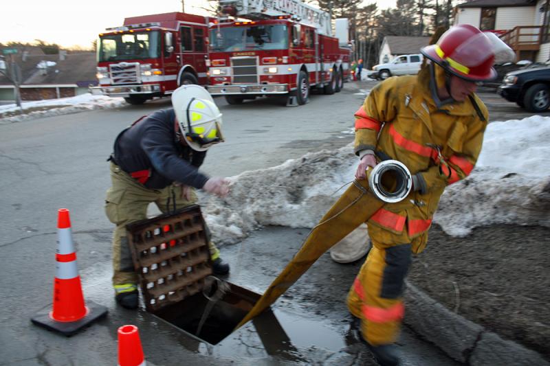 Utilizing the drainage culvert allowed fire trucks and pumpers to use the road without fear of running over a water line. (Photo by Holly S. Edwards)