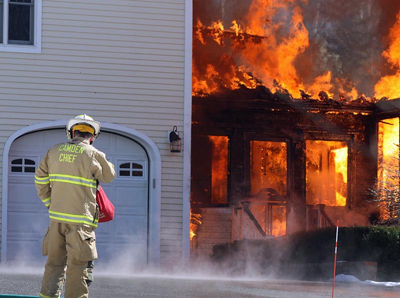 Camden Fire Chief at Tuesday afternoon's house fire on Lily Pond Drive. (Photo by Holly S. Edwards)